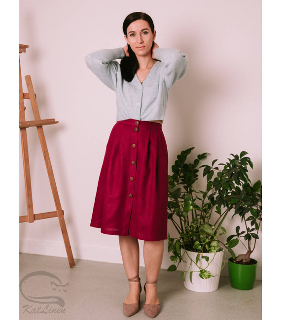Linen straight midi skirt fastened with buttons at the front